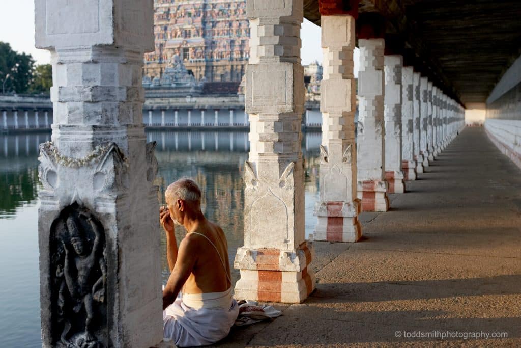 man practicing pranayama at Chidambaram Temple, India